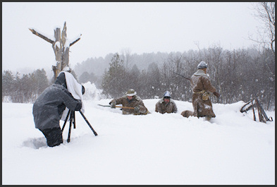 Steven Oatley capturing a high action shot in the snowy trenches